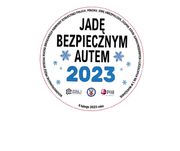 logo akcji - koło z napisami Jadę bezpiecznym autem 2023